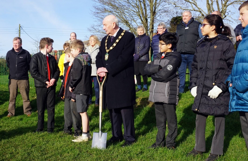 District Council Chairman Steve England leads the turf cutting ceremony.