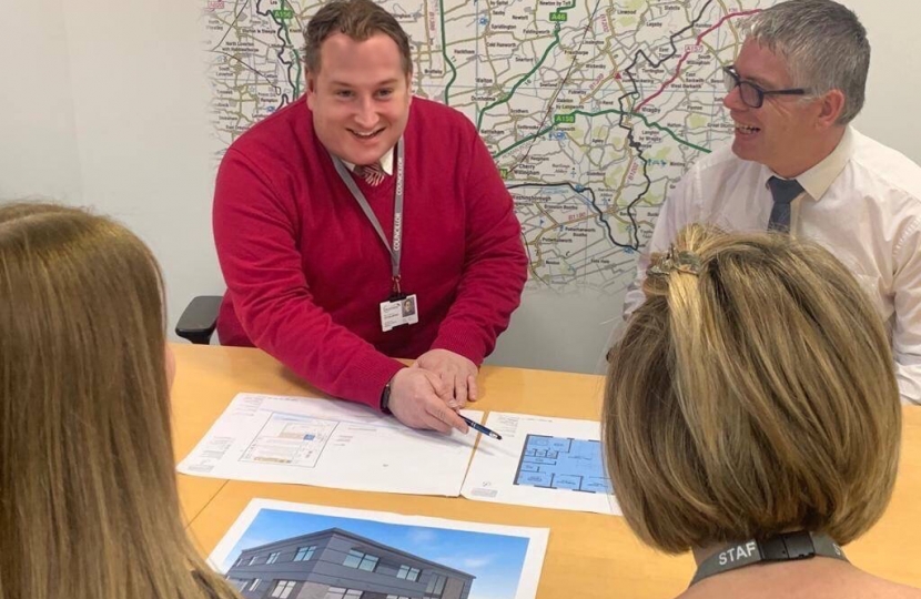 Giles McNeill looks over the plan with council officers, prior to the lockdown.