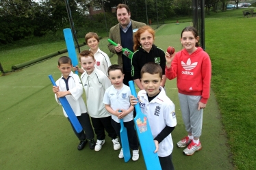 Cllr. McNeill with members of Nettleham Cricket Club Juniors