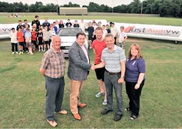 Cllr. McNeill shakes hands with Nettleham Cricket Club's David Wheatley