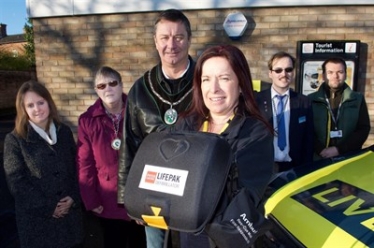 Mayor & Consort of Market Rasen with LIVES Chief Executive and Cllr. Thomas Smith with Defibrillator unit